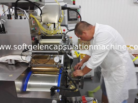 La macchina del creatore della capsula dell'olio di origine della noce di cocco, incapsula l'attrezzatura di riempimento e la formula